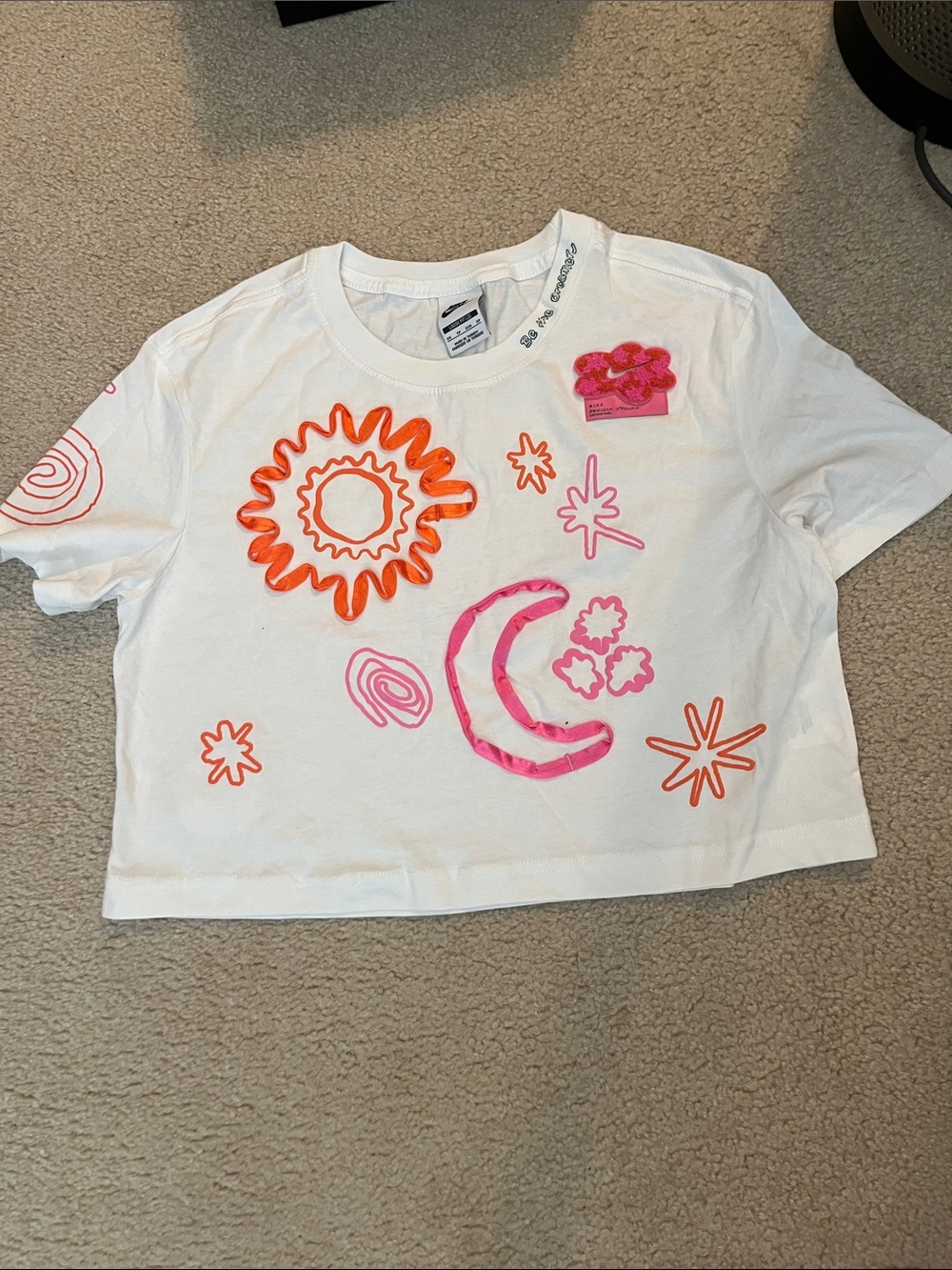 Nike White Crop Tee with Pink & Orange Graphic Motifs